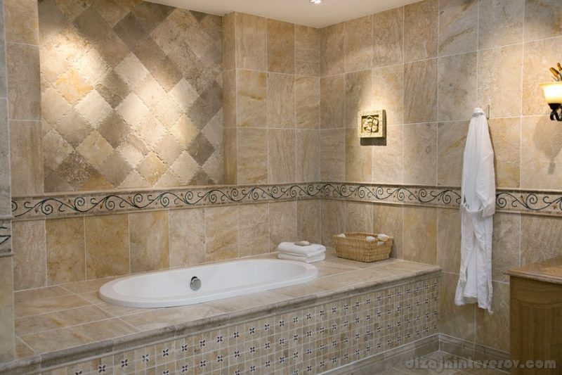 Luxurious modern bathroom with bathtub and hanging bathrobe