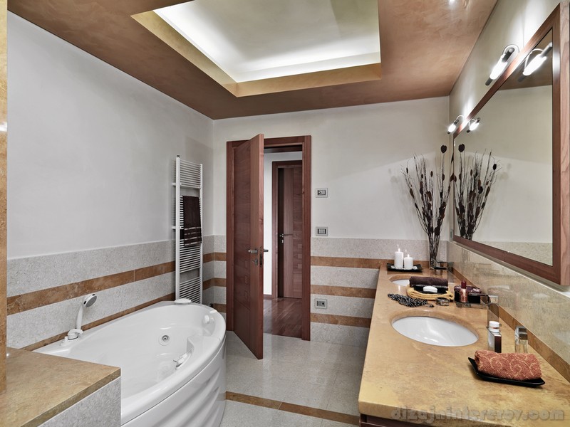 interior view of modern bathroom in foreground bathtub and washbasin