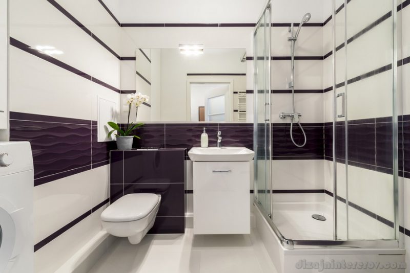 Modern bathroom with shower cubicle in white and violet color