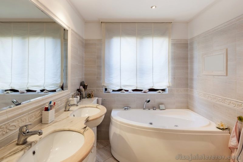 Bathroom of a modern apartment, marble cladding